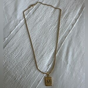 Gold M necklace
